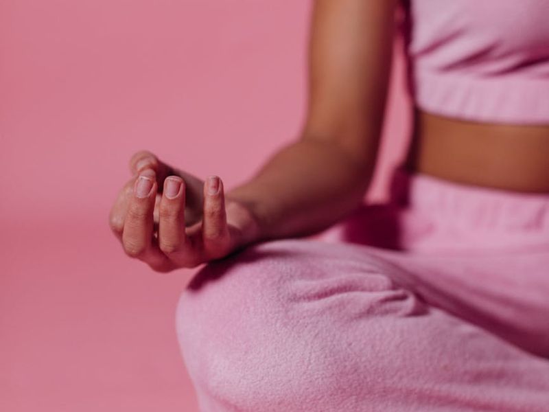 Close up of hands during a yoga meditation session